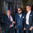 Johnny Depp à la sortie de la Royal Court of Justice, à Londres, le 26 février 2020, dans le cadre de son bras de fer judiciaire contre le tabloïd "The Sun".