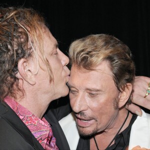 Mickey Rourke et Johnny Hallyday - Soirée pour les 50 ans de Christian Audigier au Petersen Museum de Los Angeles.