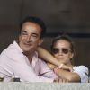 Olivier Sarkozy et Mary-Kate Olsen complices lors du tournoi de l'US Open à Flushing le 1er septembre 2014.