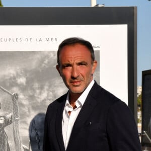 Inauguration de l'exposition des photographies de Nikos Aliagas "Thalassa, peuples de la mer" sur la croisette à Cannes le 25 juin 2020.