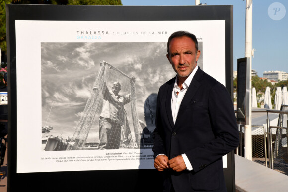Inauguration de l'exposition des photographies de Nikos Aliagas "Thalassa, peuples de la mer" sur la croisette à Cannes le 25 juin 2020.