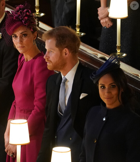 Catherine Kate Middleton, duchesse de Cambridge, le prince Harry, duc de Sussex, Meghan Markle, duchesse de Sussex - Cérémonie de mariage de la princesse Eugenie d'York et Jack Brooksbank en la chapelle Saint-George au château de Windsor le 12 octobre 2018.