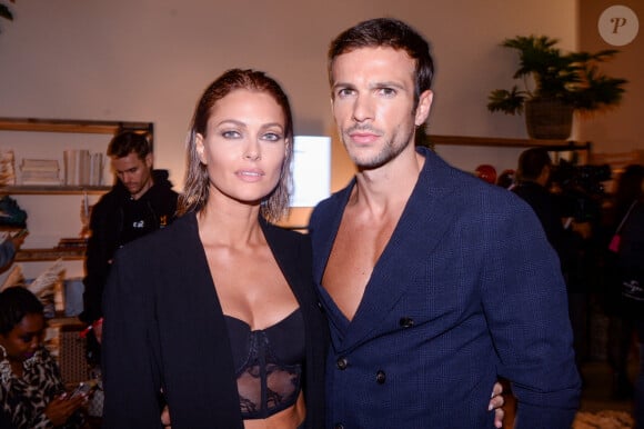 Exclusif - Caroline Receveur et son compagnon Hugo Philip - Les people dans l'espace Experience Immersive réservé aux VIP lors du Etam Live Show 2019 au Stade Roland Garros lors de la fashion week à Paris, le 24 septembre 2019. © Rachid Bellak/Bestimage