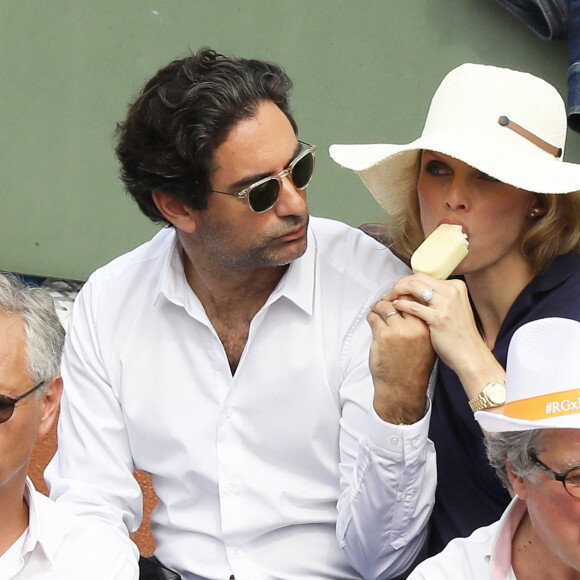 Sylvie Tellier (enceinte) et son mari Laurent dans les tribunes des Internationaux de France de Tennis de Roland Garros à Paris, le 10 juin 2018. © Dominique Jacovides - Cyril Moreau/Bestimage