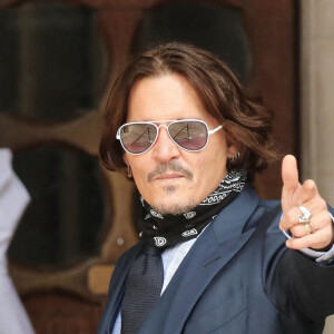 Johnny Depp et Amber Heard à la cour de justice à Londres dans le cadre du procès contre le journal The Sun le 14 juillet 2020.