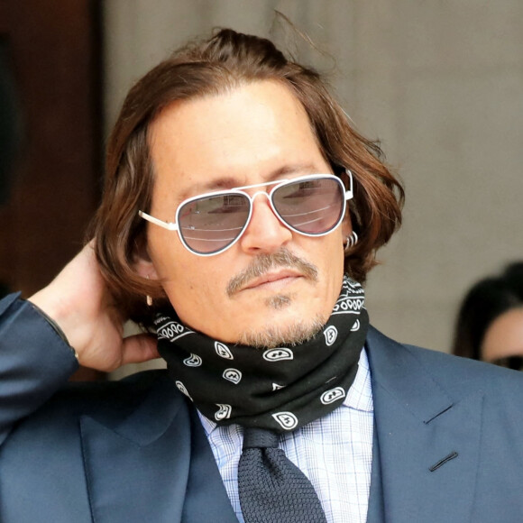 Johnny Depp et Amber Heard à la cour de justice à Londres dans le cadre du procès contre le journal The Sun le 14 juillet 2020.