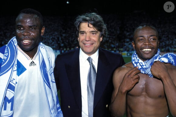 Basile Boli, Bernard Tapie et Abedi Pelé lors de la finale de la Champions League contre l'A.C. Milan. Munich, le 26 mai 1993.