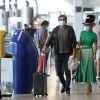 Exclusif - Laeticia Hallyday et son compagnon Pascal Balland arrivent à l'aéroport Roissy CDG après une échappée de trois jours à Florence, sans enfants, le 30 juin 2020.