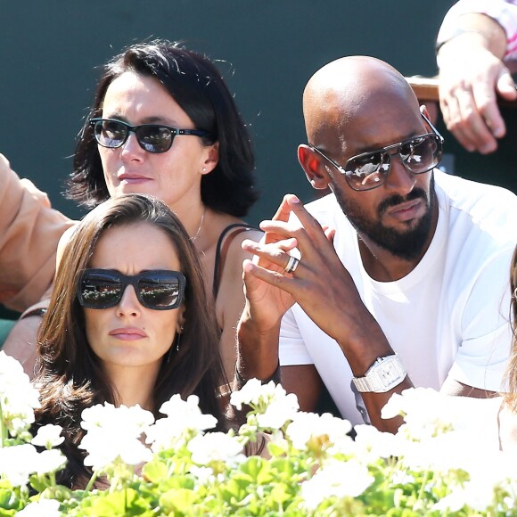 Nicolas Anelka et sa femme Barbara - La France a remporté la demi-finale de la Coupe Davis face à la République tchèque à Roland Garros à Paris, le 13 septembre 2014.