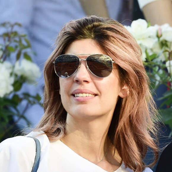 Nikos Aliagas et sa femme Tina dans les tribunes lors des internationaux de tennis de Roland Garros à Paris, France, le 31 mai 2019. © Jean-Baptiste Autissier/Panoramic/Bestimage 