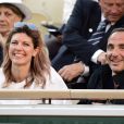 Nikos Aliagas et sa femme Tina dans les tribunes lors des internationaux de tennis de Roland Garros à Paris, France, le 31 mai 2019. © Jean-Baptiste Autissier/Panoramic/Bestimage   