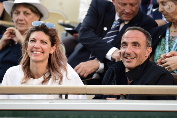 Nikos Aliagas et sa femme Tina dans les tribunes lors des internationaux de tennis de Roland Garros à Paris, France, le 31 mai 2019. © Jean-Baptiste Autissier/Panoramic/Bestimage 