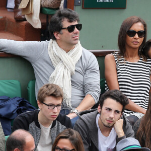 Stéphane Plaza , Karine Le Marchand et sa fille Alya aux Internationaux de France de tennis de Roland Garros à Paris, le 29 mai 2014.