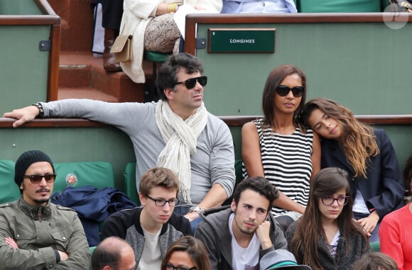 Stéphane Plaza , Karine Le Marchand et sa fille Alya aux Internationaux de France de tennis de Roland Garros à Paris, le 29 mai 2014.