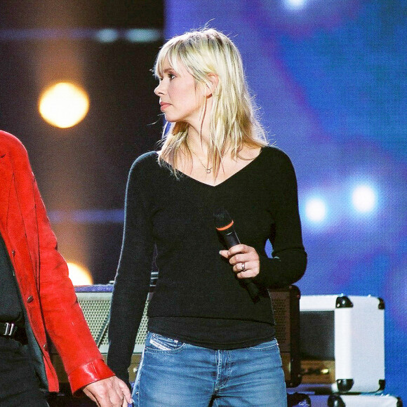 Le chanteur Renaud et sa femme Romane Serda en concert pour les 20 ans du Zenith de Paris en 2005. © Patrick Carpentier / Bestimage