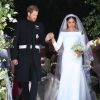 Le prince Harry et Meghan Markle (en robe de mariée Givenchy), duc et duchesse de Sussex, à la sortie de chapelle St. George au château de Windsor après leur mariage