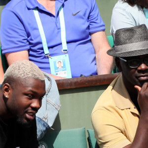 Lilian Thuram et son fils Marcus Thuram - People dans les tribunes lors des Internationaux de France de Tennis de Roland-Garros à Paris le 2 juin 2018. © Dominique Jacovides-Cyril Moreau / Bestimage 