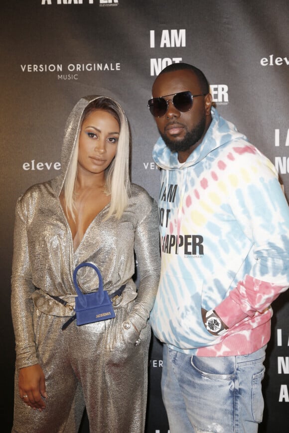 Le rappeur Gims (Maître Gims - Gandhi Djuna) et sa femme Demdem Djuna lors de la soirée de lancement de la collection capsule "I'm not a rapper" de la marque Elevenparis (Eleven Paris) à Paris. © Christophe Aubert via Bestimage 