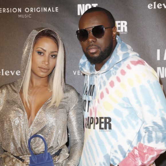Le rappeur Gims (Maître Gims - Gandhi Djuna) et sa femme Demdem Djuna lors de la soirée de lancement de la collection capsule "I'm not a rapper" de la marque Elevenparis (Eleven Paris) à Paris. © Christophe Aubert via Bestimage 