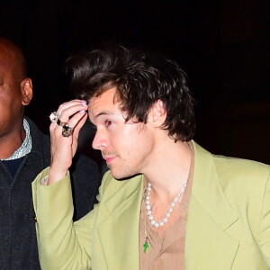 Harry Styles Looks Bleary Eyed as he Parties Until 4am with Longtime Pal Jeff Azoff in New York City, NY, USA, on March 01, 2020. The British singer appeared to be a bit worse for wear as he and his buddy made a surprise appearance at the SNL After Party, after supporting David Byrne on the show. Harry wore blue trousers, a tan shirt and light green blazer on his way into the party at L'Avenue in Midtown. Photo by Diggzy/Splash News/ABACAPRESS.COM 