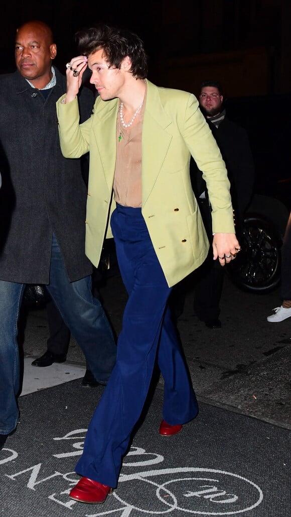 Harry Styles Looks Bleary Eyed as he Parties Until 4am with Longtime Pal Jeff Azoff in New York City, NY, USA, on March 01, 2020. The British singer appeared to be a bit worse for wear as he and his buddy made a surprise appearance at the SNL After Party, after supporting David Byrne on the show. Harry wore blue trousers, a tan shirt and light green blazer on his way into the party at L'Avenue in Midtown. Photo by Diggzy/Splash News/ABACAPRESS.COM 