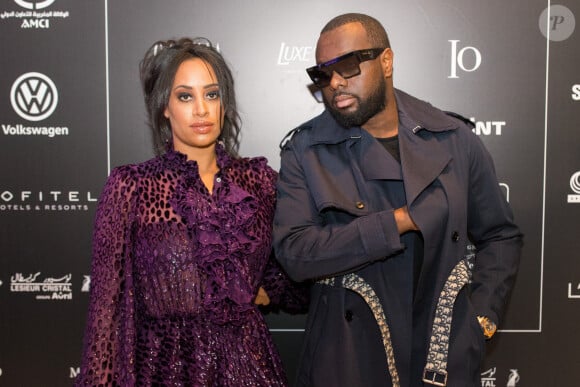 Exclusif - Le rappeur Gims (Maître Gims - Gandhi Djuna) et sa femme Demdem Djuna lors du photocall de la 14ème édition du Casa Fashion Show au Sofitel Casablanca Tour Blanche à Casablanca, Maroc, le 20 avril 2019. © Philippe Doignon/Bestimage