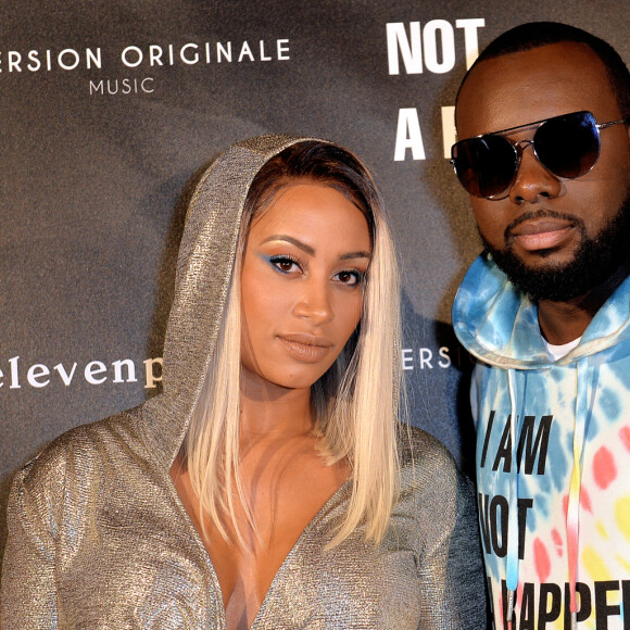 Le rappeur Gims (Maître Gims - Gandhi Djuna) et sa femme Demdem Djuna lors de la soirée de lancement de la collection capsule "I'm not a rapper" de la marque Elevenparis (Eleven Paris) à Paris, France, le 11 avril 2019. © Veeren/Bestimage