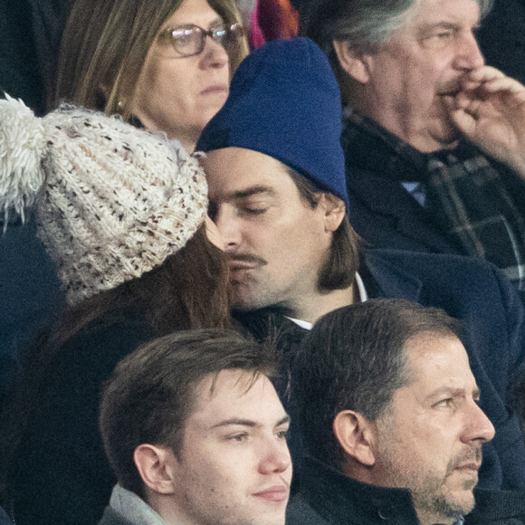 Camille Lacourt et sa compagne Alice Detollenaere (Miss Bourgogne 2010) dans les tribunes lors du match de championnat de Ligue 1 Conforama opposant le Paris Saint-Germain (PSG) aux Girondins de Bordeaux au Parc des Princes à Paris, France, le 23 février 2020. Le PSG a gagné 4-3. © Cyril Moreau/Bestimage