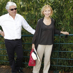 Marie-Anne Chazel et son compagnon Philippe Raffard - People à la première journée des internationaux de France de Roland-Garros. Le 27 mai 2012.