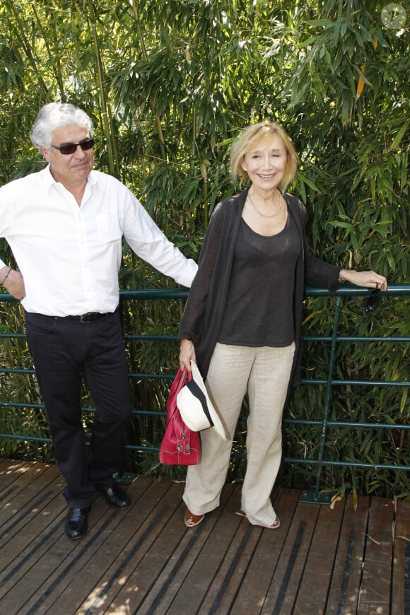 Marie-Anne Chazel et son compagnon Philippe Raffard - People à la première journée des internationaux de France de Roland-Garros. Le 27 mai 2012.