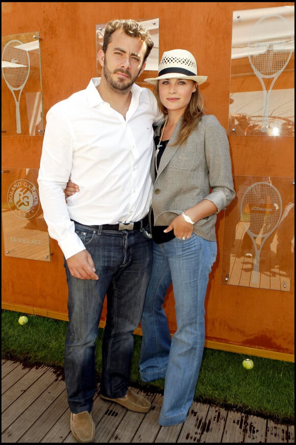 Thierry Ascione et Mélanie Maudran à Roland-Garros le 28 mai 2010.