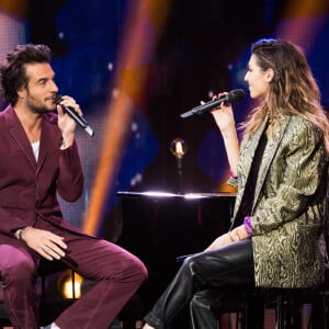 Amir Haddad et Laury Thilleman - Enregistrement de l'émission "Fête de la chanson française" à l'Olympia à Paris, qui sera diffusée le 9 janvier sur France 2. © Tiziano Da Silva - Cyril Moreau / Bestimage