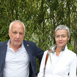 François Berléand et sa compagne Alexia Strési - People dans le village lors du tournoi de tennis de Roland-Garros à Paris, le 2 juin 2015.