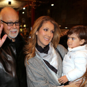 Céline Dion, René Angélil et leurs enfants, René-Charles et un de leurs jumeaux à la sortie de l'hôtel George V à Paris le 30 novembre 2012 