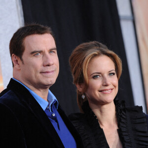 John Travolta et Kelly Preston - Première du film "The Last Song" à l'ArcLight Theatre. Hollywood. Le 25 mars 2010.