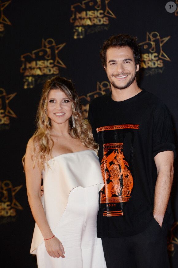 Amir Haddad et sa femme Lital (enceinte) - 20e cérémonie des NRJ Music Awards au Palais des Festivals à Cannes. Le 10 novembre 2018. © Christophe Aubert via Bestimage