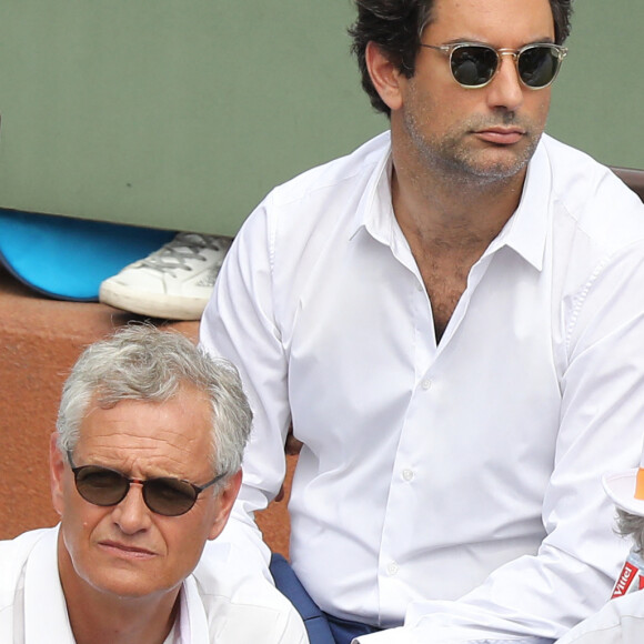 Sylvie Tellier (enceinte) et son mari Laurent dans les tribunes des Internationaux de France de Tennis de Roland Garros à Paris, le 10 juin 2018. © Dominique Jacovides - Cyril Moreau/Bestimage