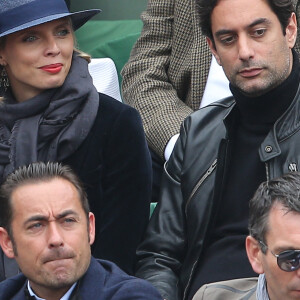 Sylvie Tellier et son compagnon Laurent dans les tribunes de la finale homme des internationaux de France de Roland Garros à Paris le 5 juin 2016. © Moreau-Jacovides / Bestimage