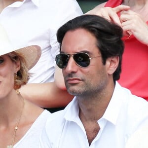 Sylvie Tellier et son compagnon Laurent - People à la finale homme des Internationaux de France de tennis de Roland Garros à Paris le 8 juin 2014.