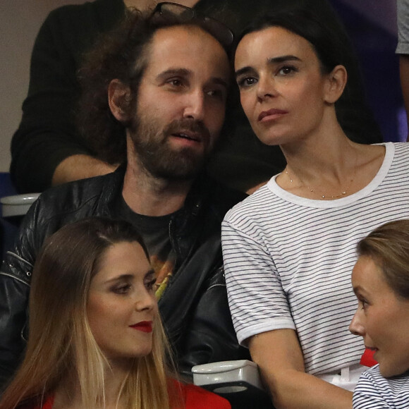 Elodie Bouchez et son mari Thomas Bangalter (groupe Daft Punk) dans les tribunes du stade de France lors du match de ligue des nations opposant la France à l'Allemagne à Saint-Denis, Seine Saint-Denis, France, le 16 octobre 2018. La France a gagné 2-1.