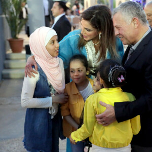 Le roi Abdallah II et la reine Rania de Jordanie lors d'un dîner avec des orphelins des institutions du ministère du Développement social, ainsi que pour les bénéficiaires du Fonds zakat de tous les gouvernorats au "Children's Museum-Jordan" à Amman. Le 29 mai 2019