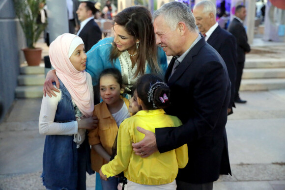 Le roi Abdallah II et la reine Rania de Jordanie lors d'un dîner avec des orphelins des institutions du ministère du Développement social, ainsi que pour les bénéficiaires du Fonds zakat de tous les gouvernorats au "Children's Museum-Jordan" à Amman. Le 29 mai 2019