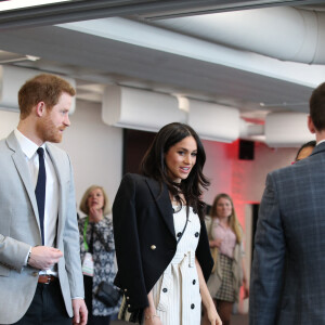 Le prince Harry et sa fiancée Meghan Markle lors d'une réception du forum des jeunes pendant le Commonwealth Heads of Government Meeting à Londres le 18 avril 2018.