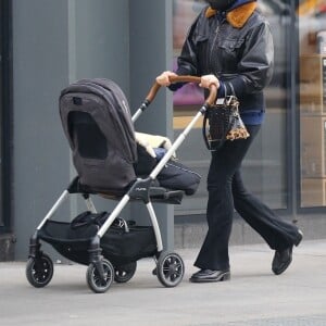 Exclusif - Chloe Sevigny promène son fils Vanja en poussette dans les rues de New York, le 1er mars 2021.