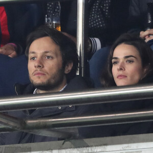 Vianney Bureau (Vianney) et sa compagne Catherine Robert dans les tribunes du parc des Princes lors du match de 8ème de finale retour de Ligue des champions opposant le Paris Saint-Germain à Manchester Unted à Paris, France, le 6 mars 2019. Manchester a gagné 3-1 (cumul des scores 3-3). © Cyril Moreau/Bestimage 