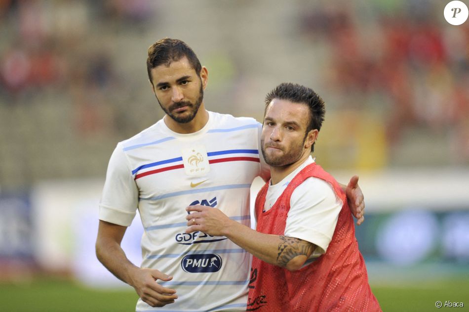 Mathieu Valbuena et Karim Benzema lors du match amical Belgique - France en août 2013.