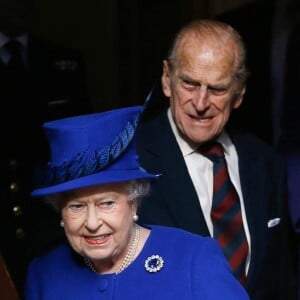 La reine Elizabeth II d 'Angleterre et le prince Philip, duc d'Edimbourg visitent l'hotel de ville de Windsor, le 29 novembre 2013 a l'occasion de l'inauguration des fenetres du jubile de diamant.