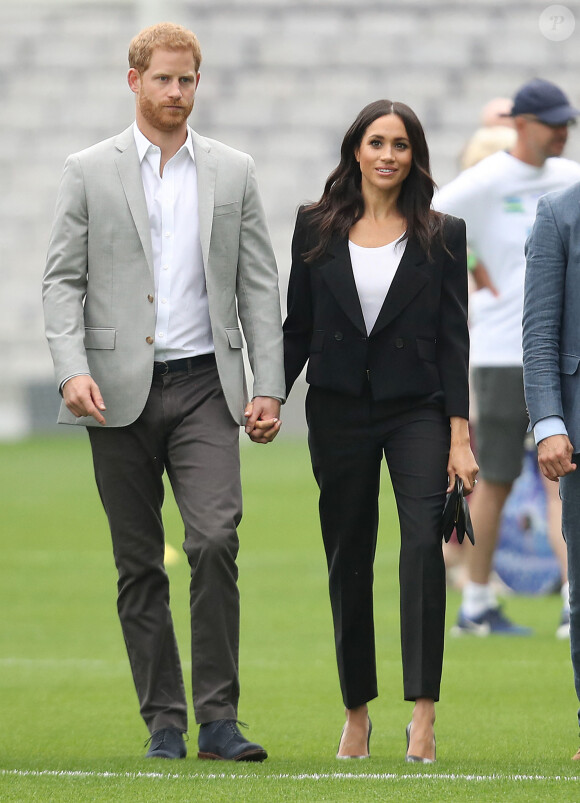 Le prince Harry, duc de Sussex et sa femme Meghan Markle, duchesse de Sussex assistent aux jeux gaélique à Croke Park à Dublin le 11 juillet 2018.