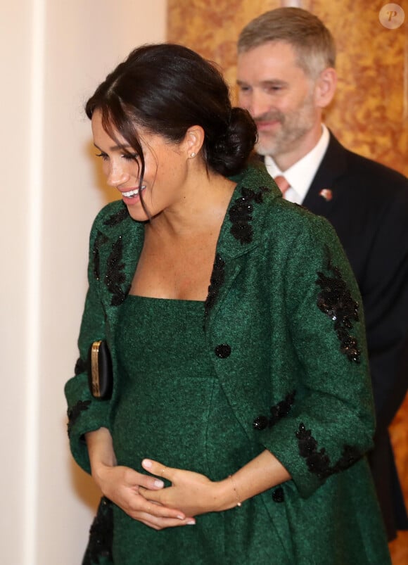 Meghan Markle, enceinte, duchesse de Sussex, lors de sa visite à Canada House dans le cadre d'une cérémonie pour la Journée du Commonwealth à Londres le 11 mars 2019.