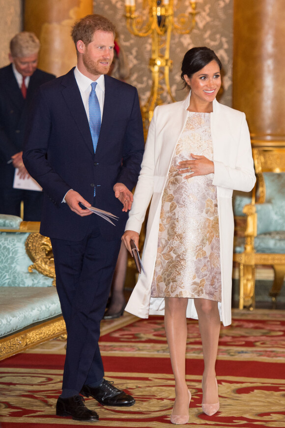 Le prince Harry, duc de Sussex, et Meghan Markle (enceinte), duchesse de Sussex - La famille royale d'Angleterre lors de la réception pour les 50 ans de l'investiture du prince de Galles au palais Buckingham à Londres.